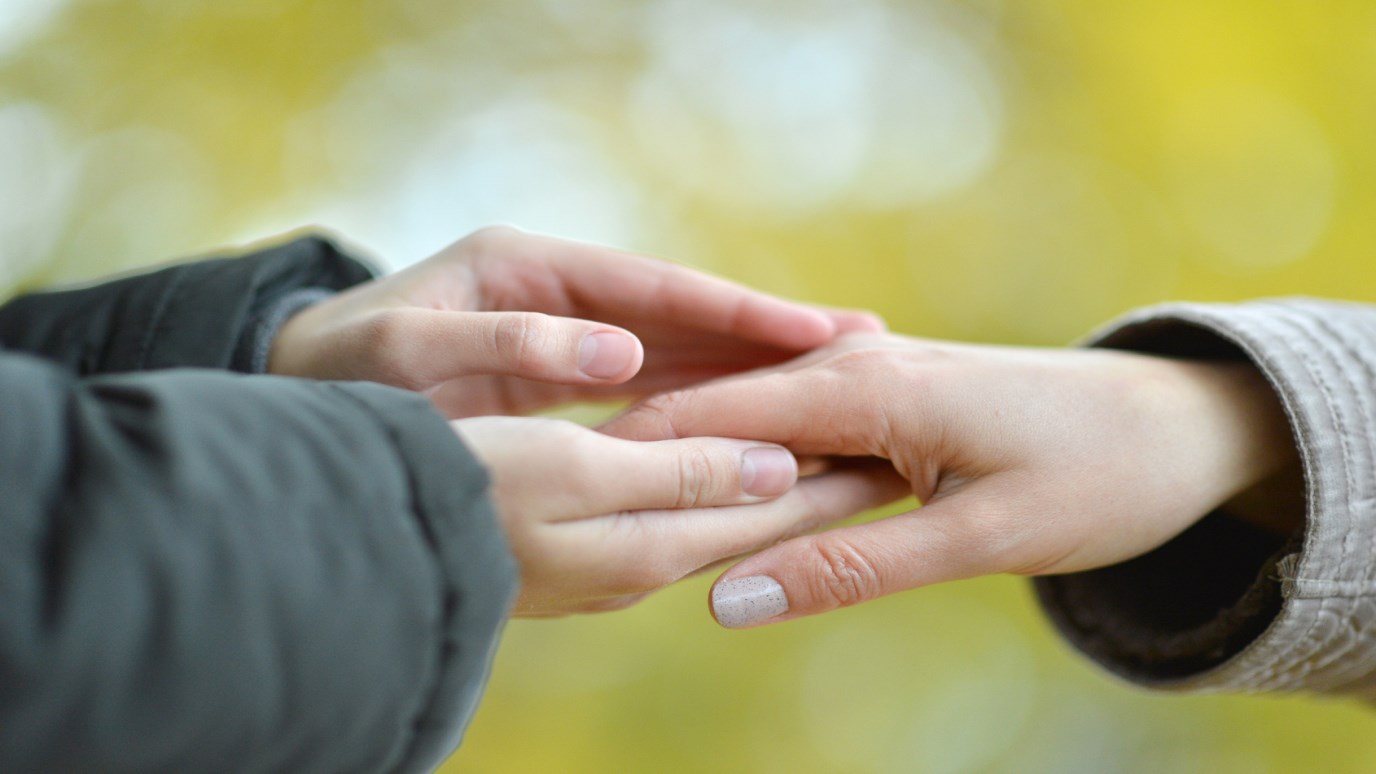 Together against. Hands Clasped together. Two hands together. Tapping and clasping hands together.